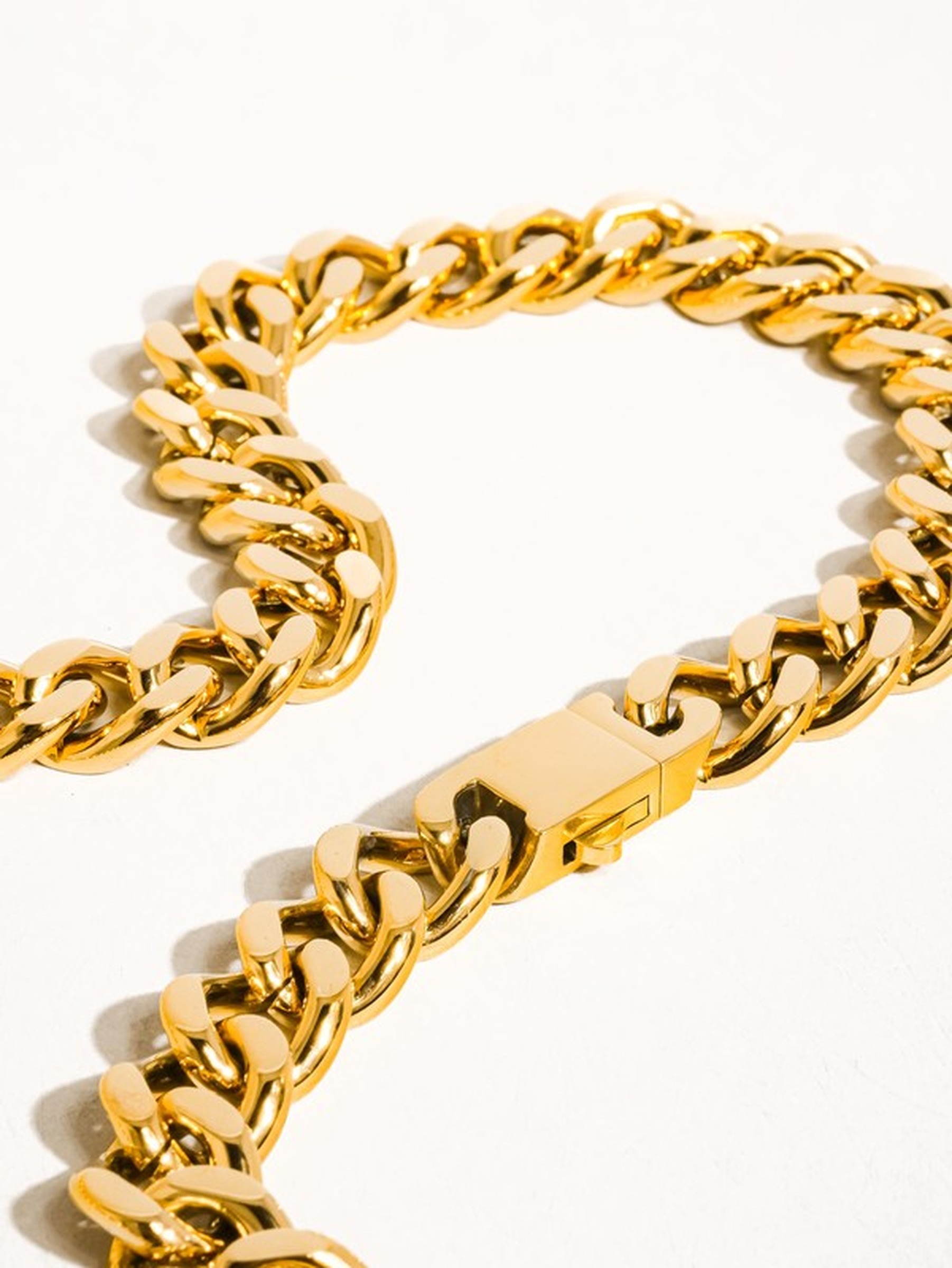 A bold curb-link chain necklace, the kind of finishing-touch jewelry Autumn & April carries.